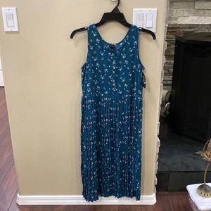 New with tags. Girls Target brand Art Class dress. Size L or 10-12.